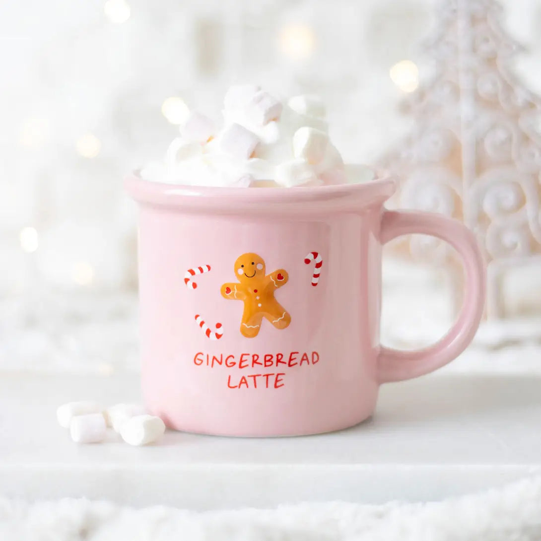 Tasse de Noël au lait d'épice rose
