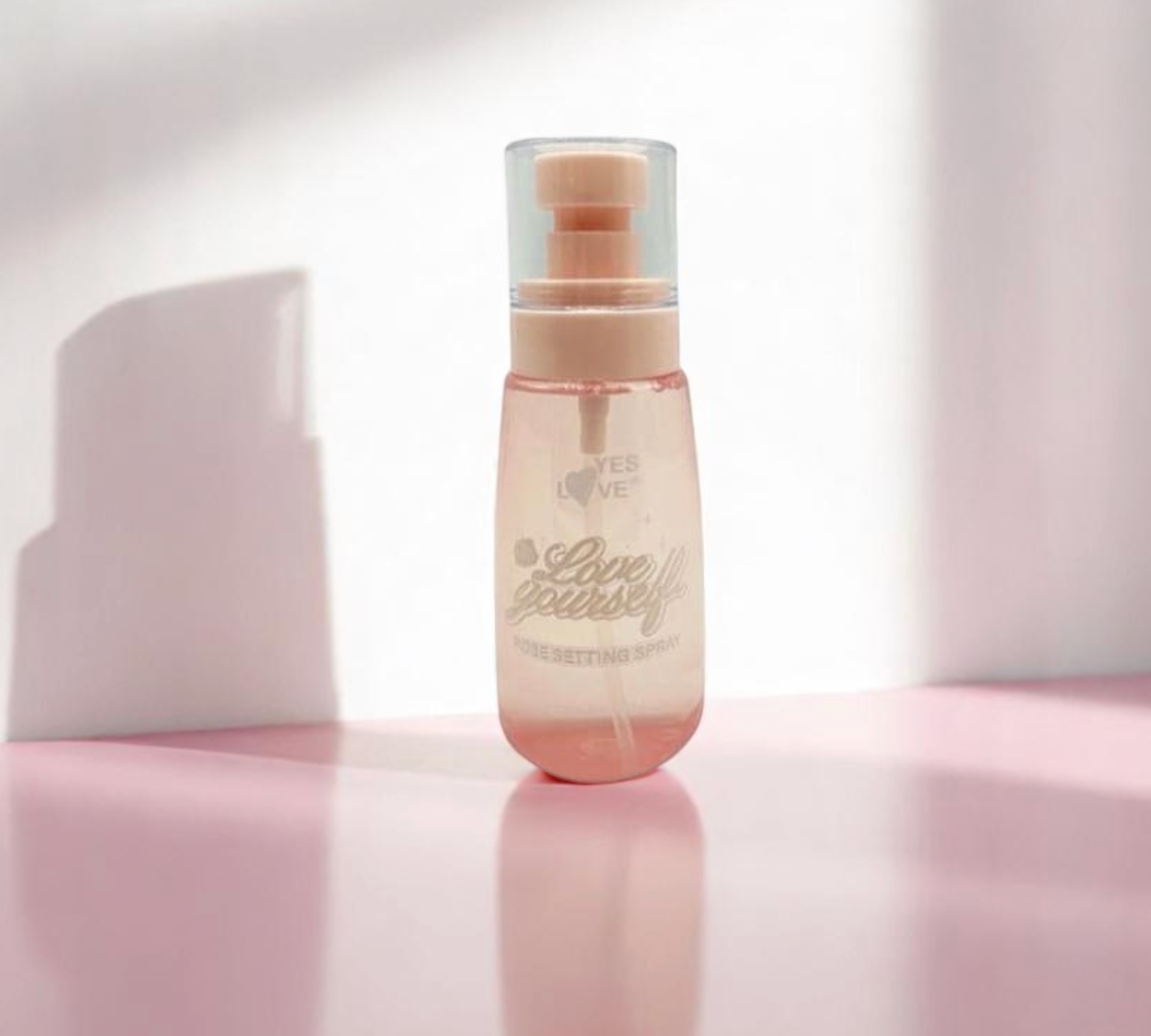 Spray fixateur à l'eau de rose